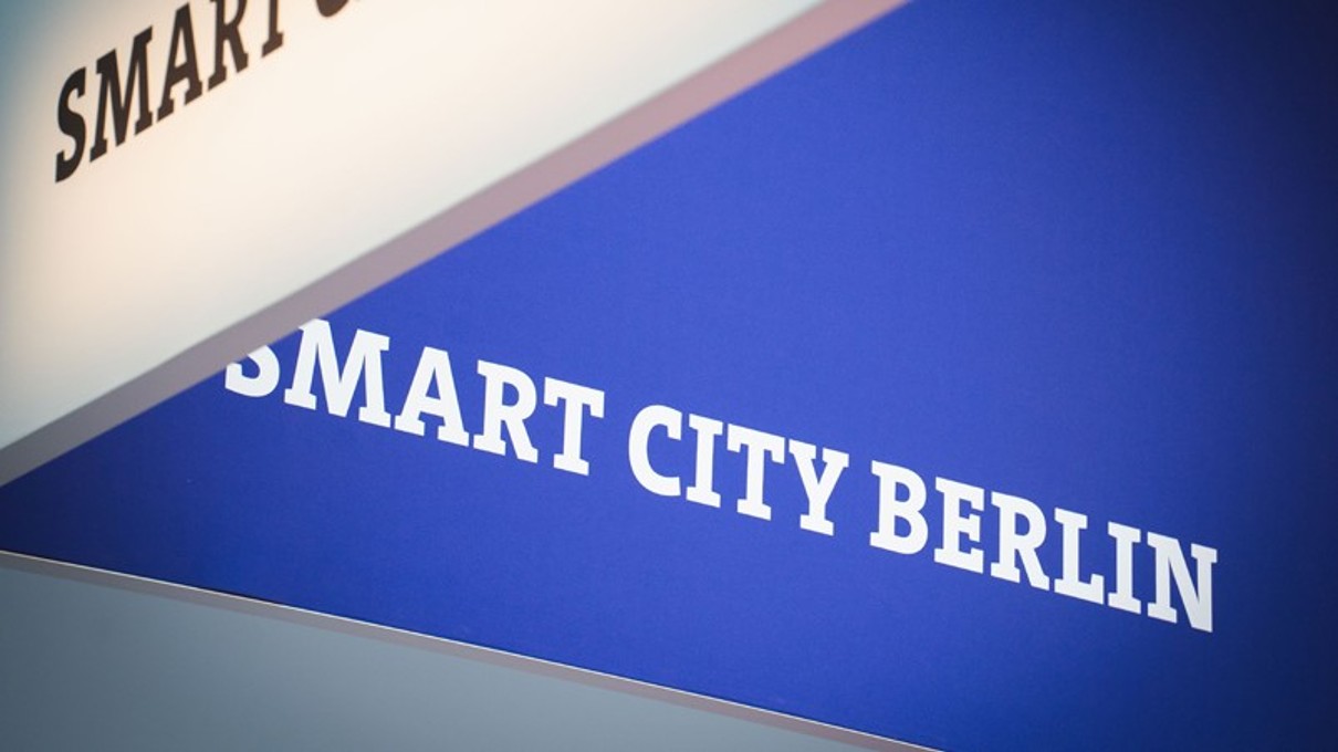 'Smart City Berlin' written in white letters on blue background