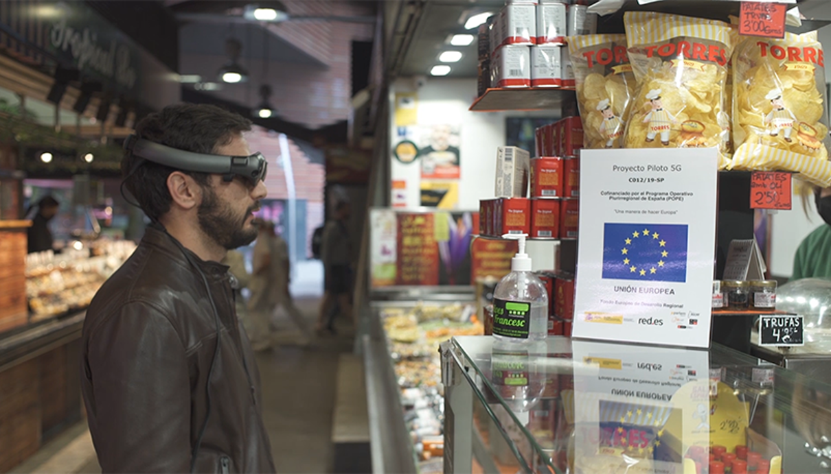Left, a man in profile wearing AR glasses; right, the counter of a supermarket.
