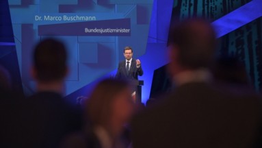 Bundesjustizminister Marko Buschmann auf der SCCON-Bühne