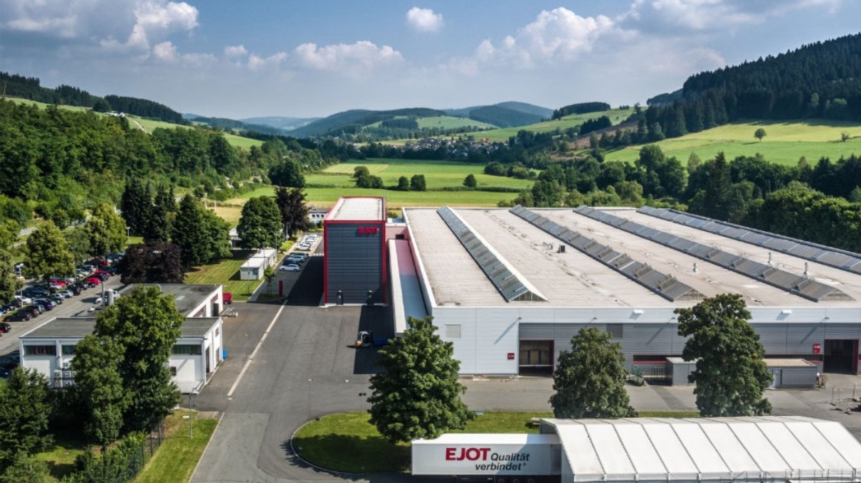 Landscape shot of South Westphalia, industry in the foreground, nature, mountains, meadows in the background.