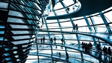 Glass dome, people in motion. 